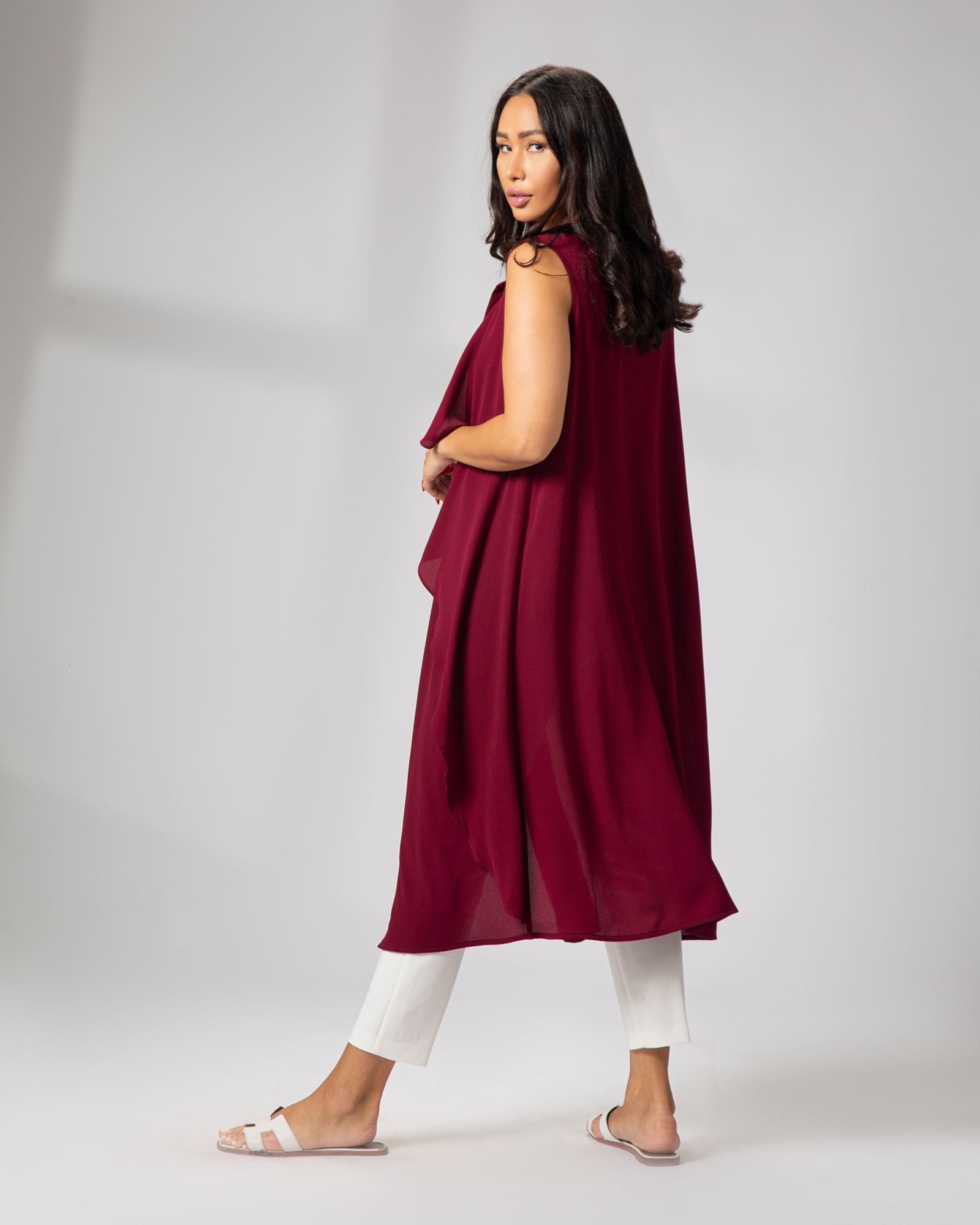 Side view of burgundy cover up from Omni The Label elegant layering piece Qatar UAE KSA