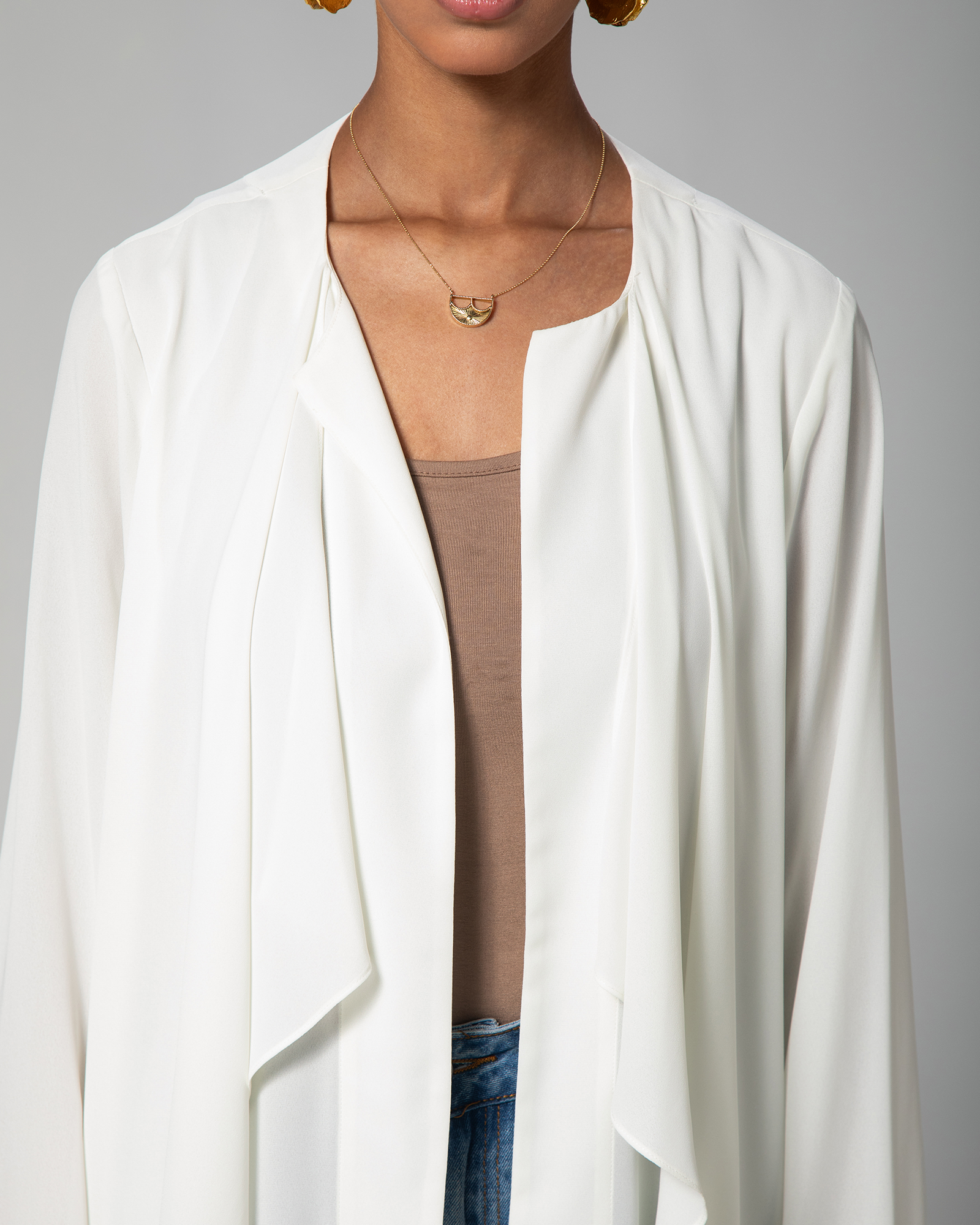Close-up of neckline and front detail of The 4pm Cover Up in White