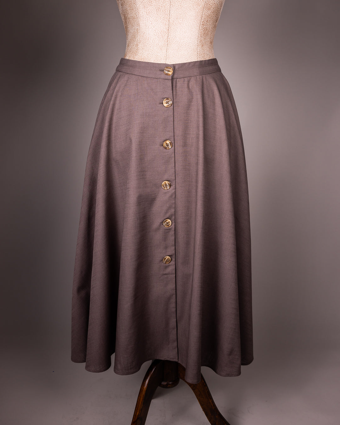 Elegant brown skirt featuring signature Arabic calligraphy on the side – Omni The Label’s bestselling embroidered skirt, loved across Qatar UAE KSA