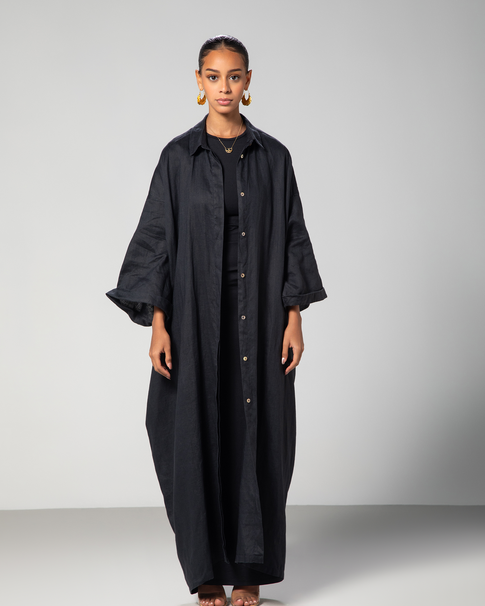 portrait of woman wearing linen kaftan black color