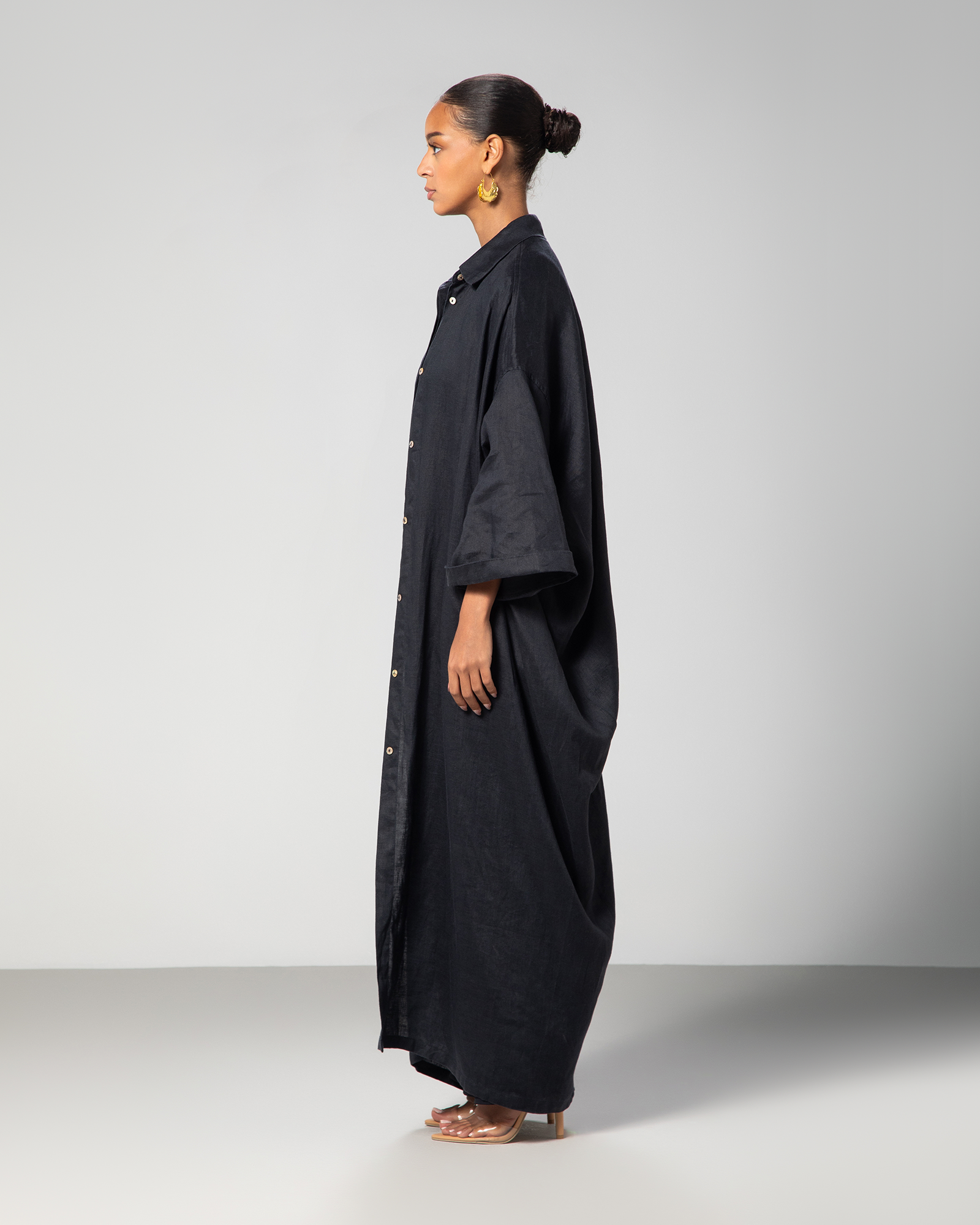 woman with long kaftan black back embroidery
