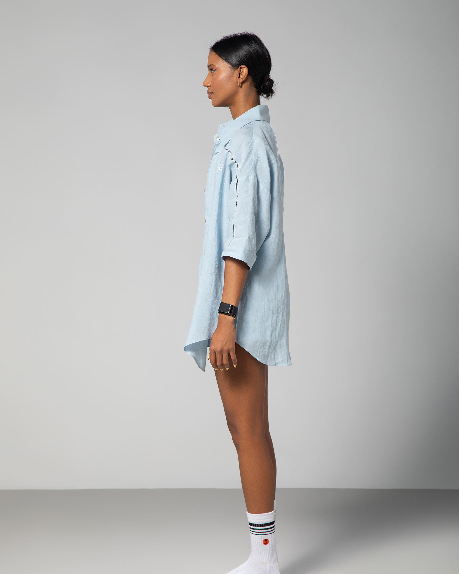 Chic and breathable linen summer set in baby blue from Omni The Label, modeled in a casual yet polished daytime outfit UAE KSA Qatar