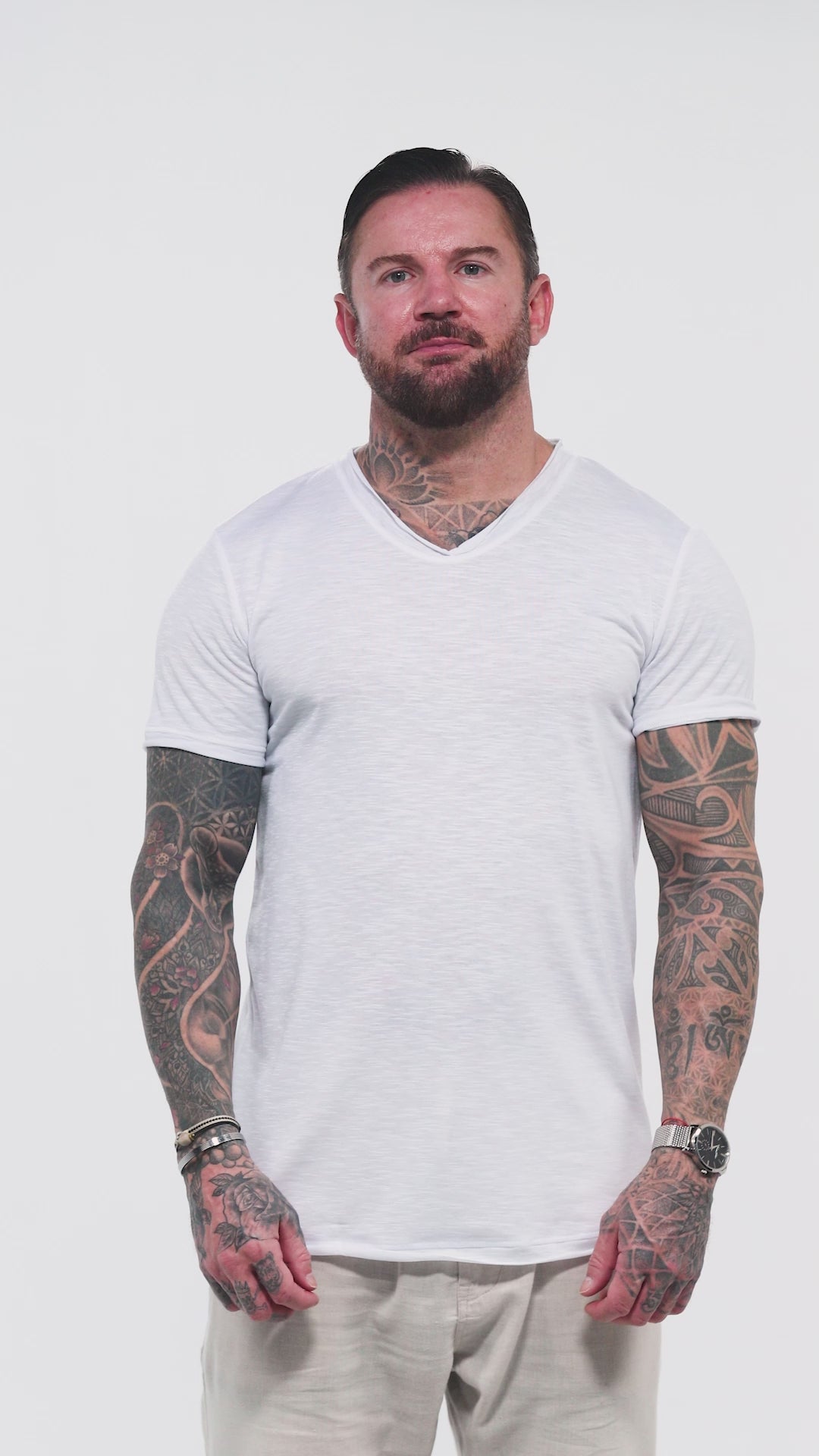 Introducing the Marbella Men’s V-neck T-shirt in white — a breathable essential crafted from 100% slub jersey cotton by Omni The Label. This video highlights the T-shirt’s relaxed fit, side and back movement, and unique vertical Arabic embroidery on the spine, available in two options: “This too shall pass” and “Who seeks, finds.” Designed for comfort, meaning, and timeless style.UAE, KSA, Qatar