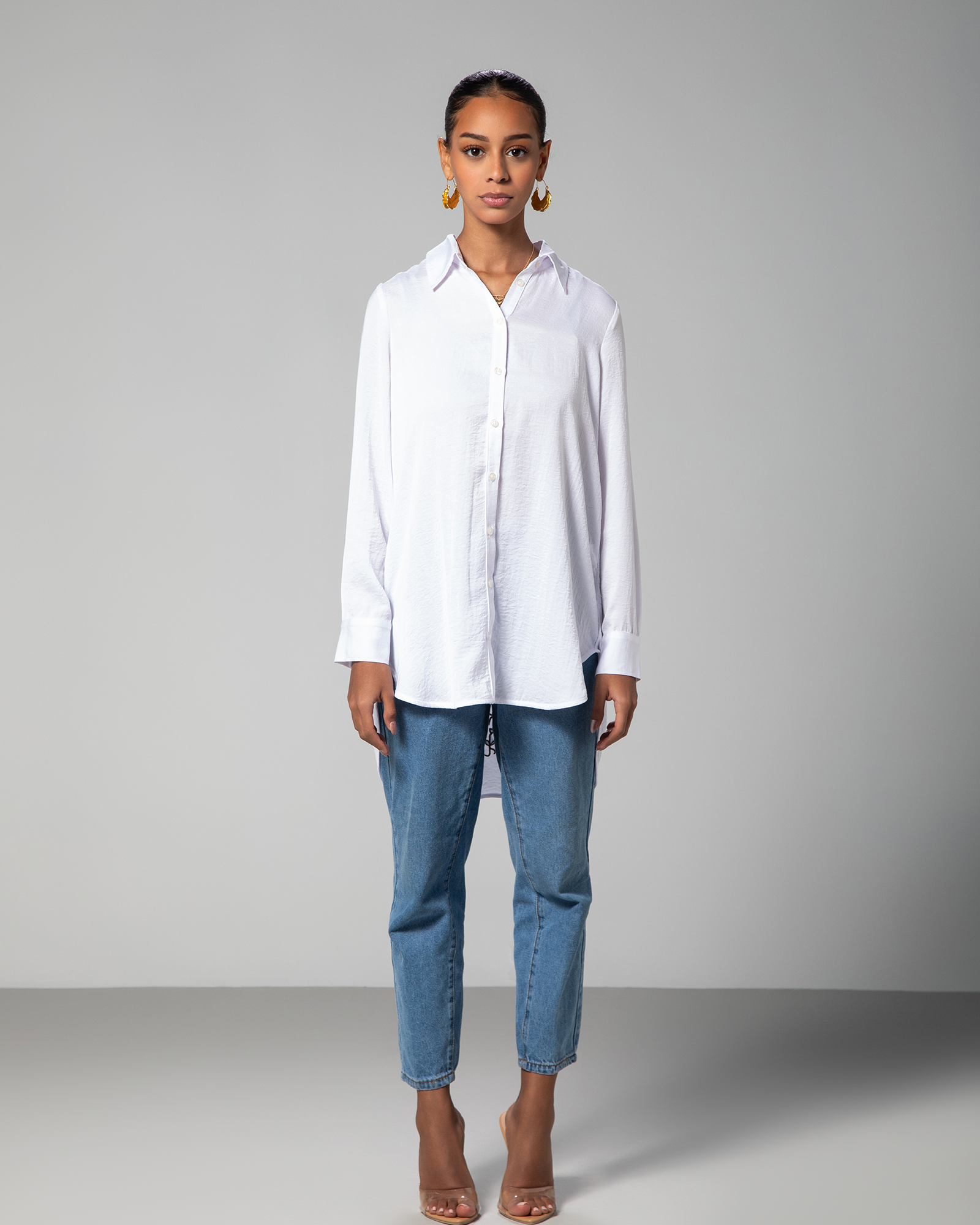 Full front view of white shirt from Omni The Label featuring minimal collar design modern Middle Eastern style Qatar UAE KSA