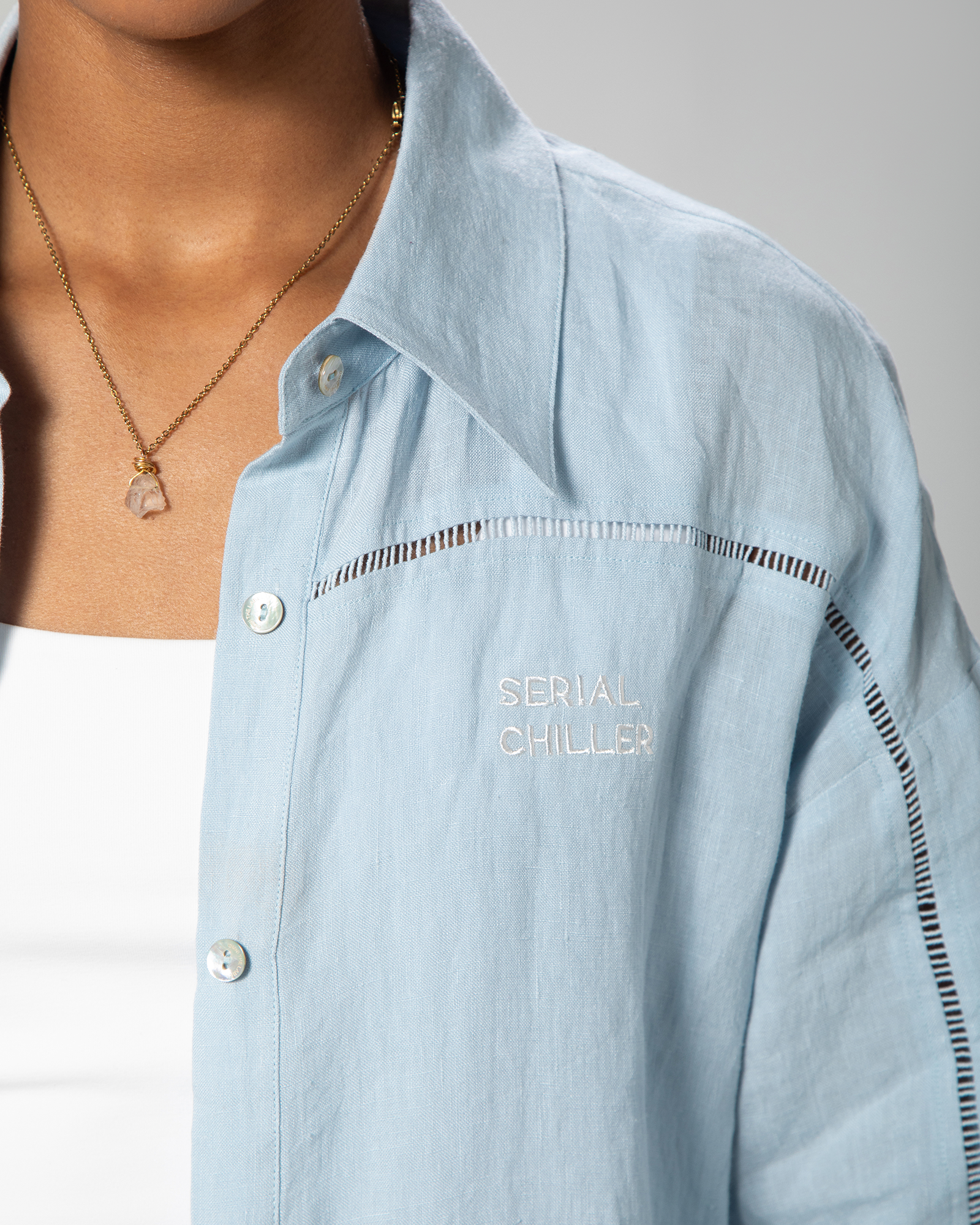Omni The Label baby blue linen co-ord set featuring a button-up shirt and high-waisted shorts, perfect for effortless warm-weather dressing UAE KSA Qatar