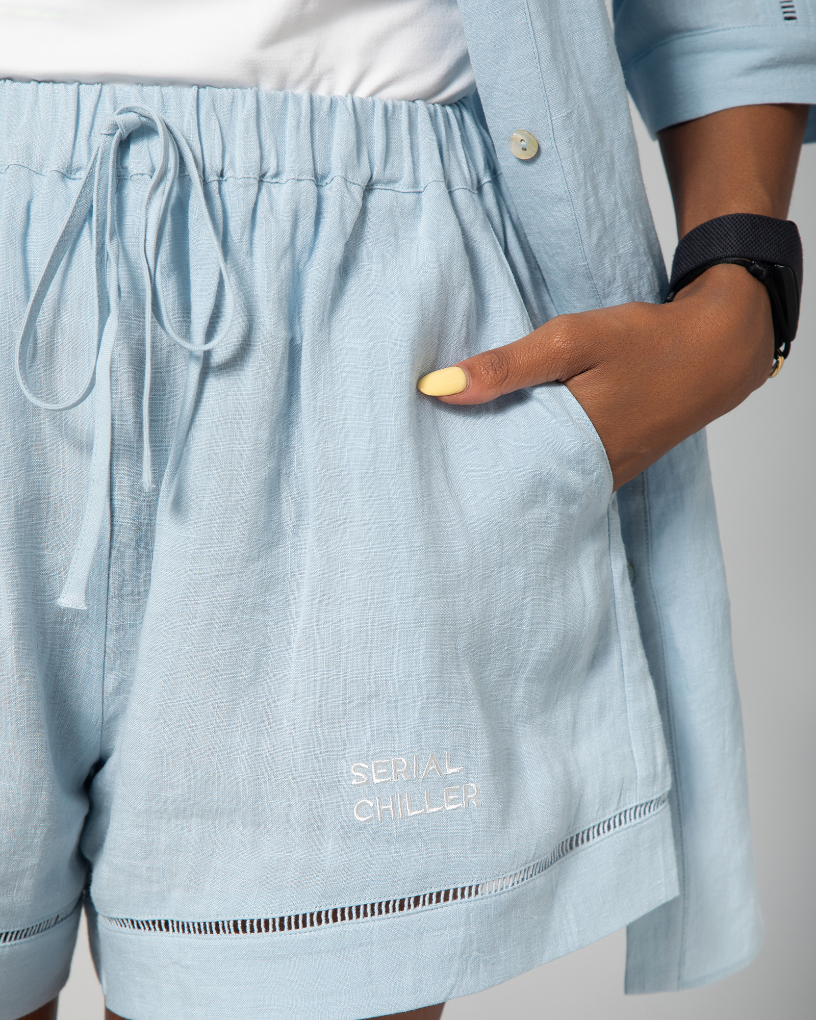Omni The Label baby blue linen co-ord set featuring a button-up shirt and high-waisted shorts, perfect for effortless warm-weather dressing UAE KSA Qatar