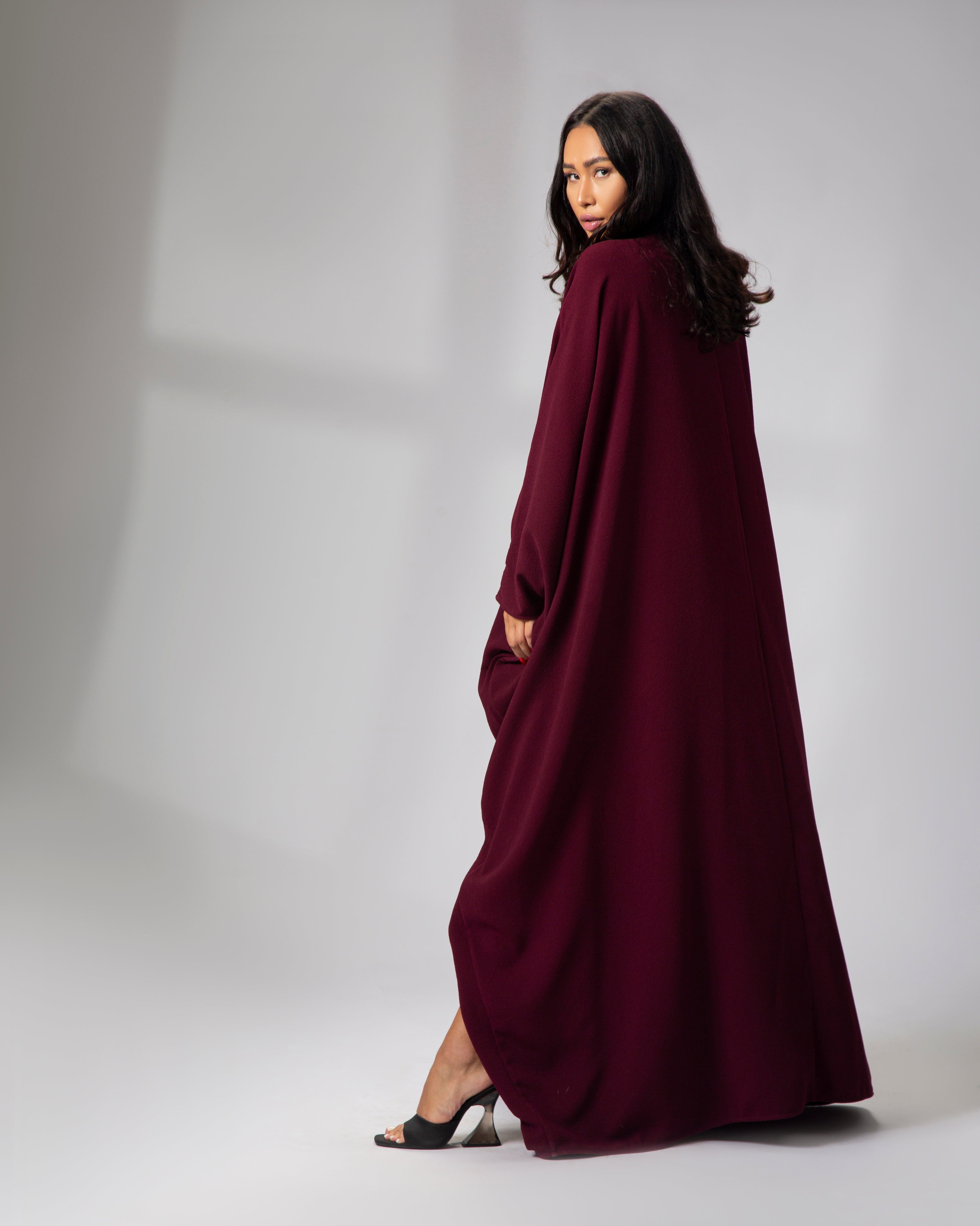 Profile view of Qatar National Day Abaya highlighting fabric texture and cut – UAE, KSA, Qatar