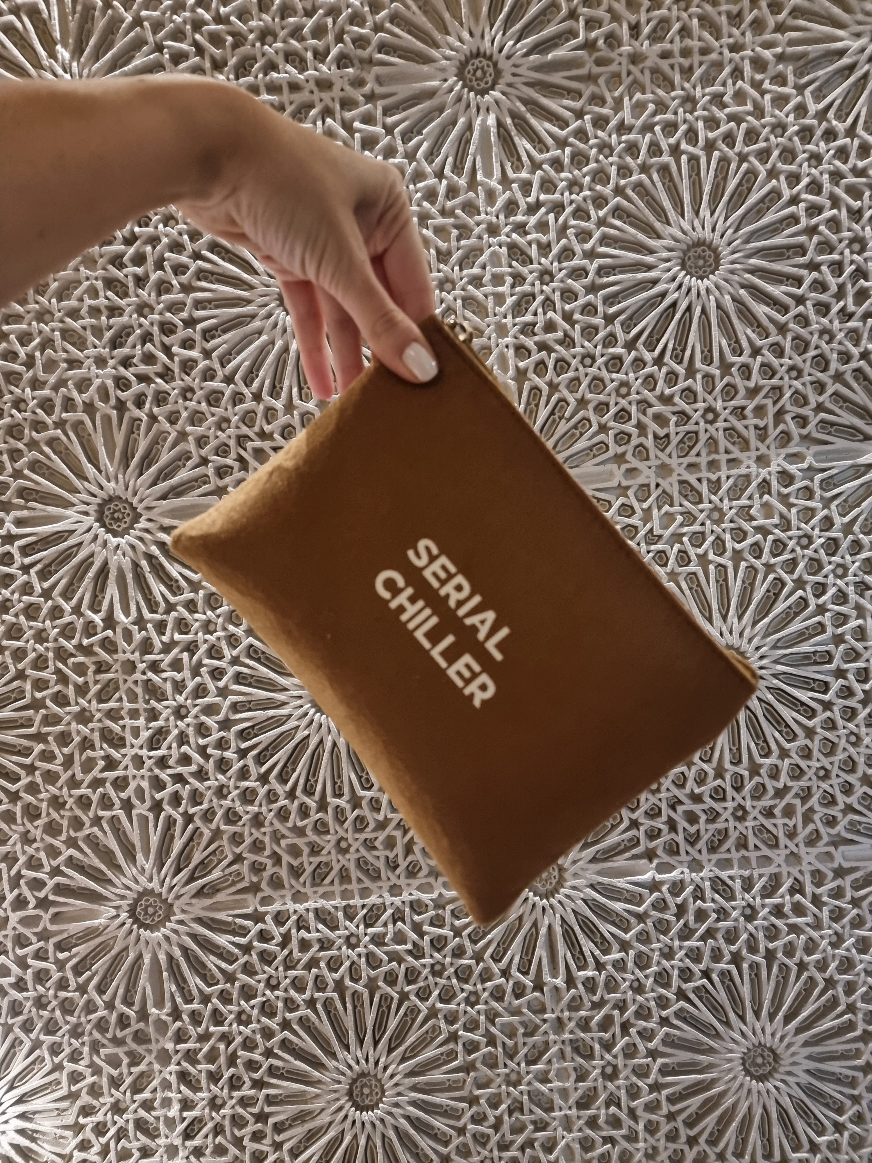 Pouch in brown color with serial chiller print UAE, KSA, Qatar
