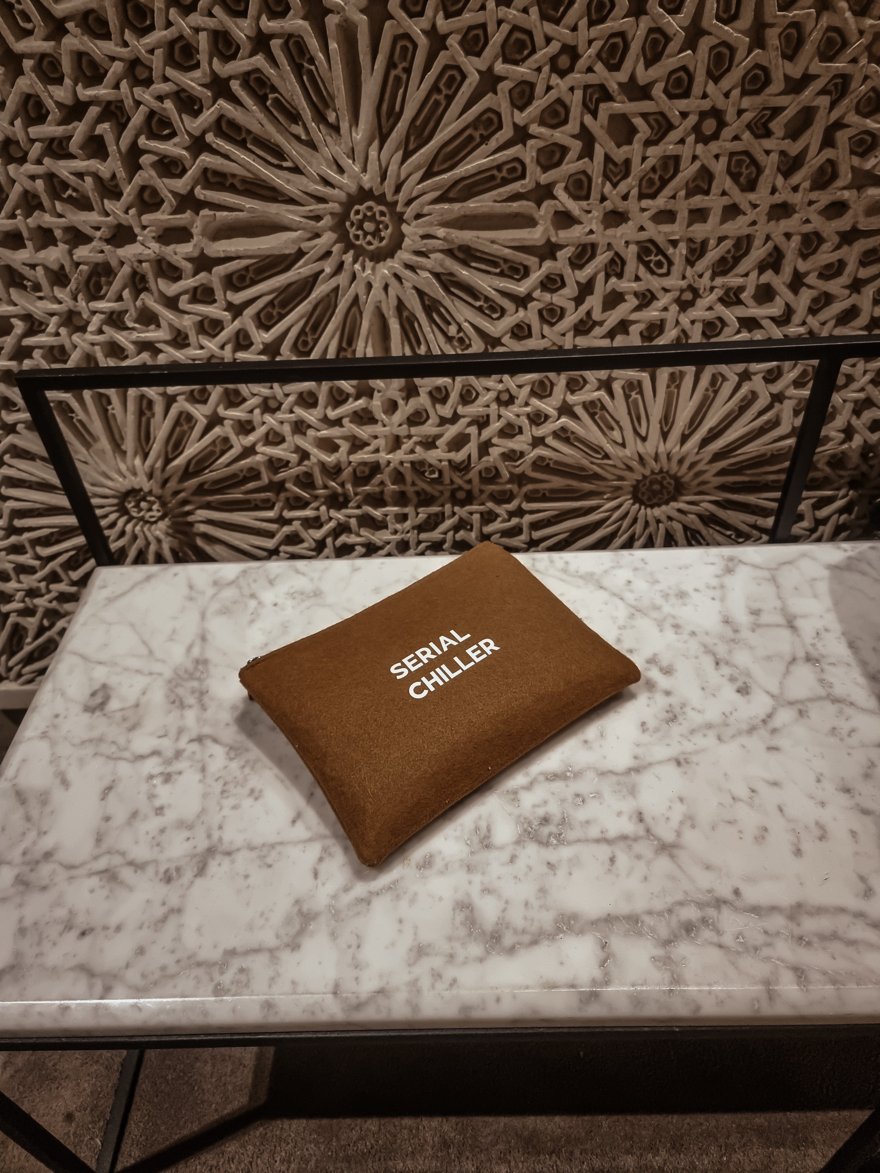 one side printed pouch in brown color UAE, KSA, Qatar