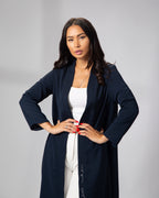 Close-up of the navy blue kimono, showing embroidery detail on front left panel and open sleeve cut KSA UAE Qatar