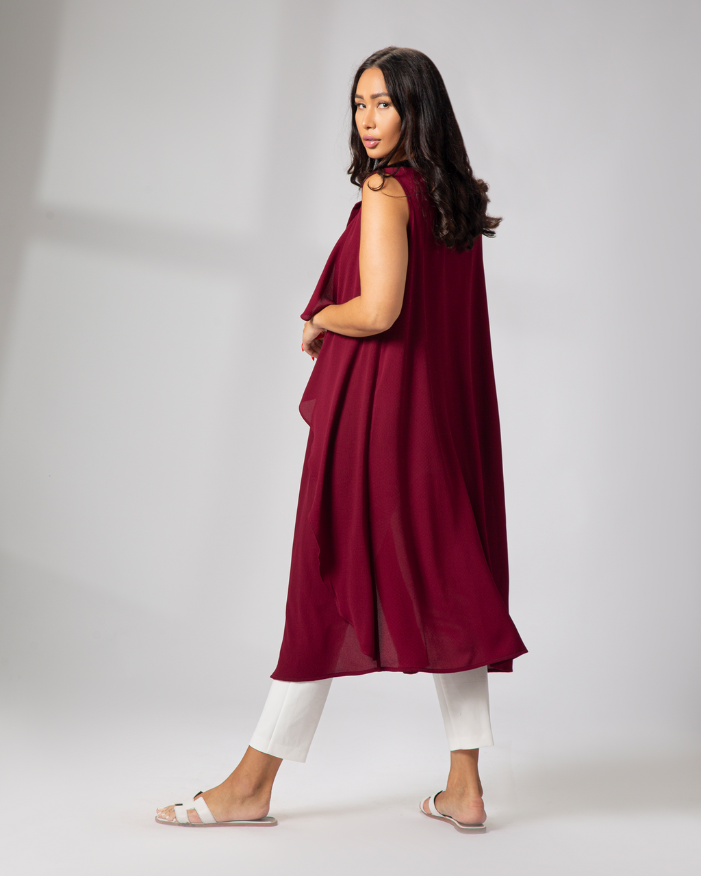 Side view of burgundy cover up from Omni The Label elegant layering piece Qatar UAE KSA