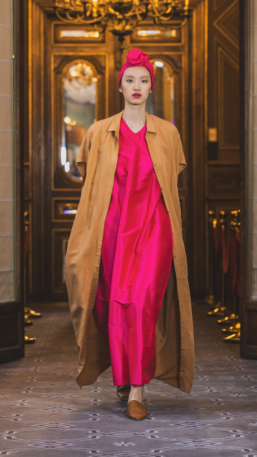 Styled look pairing camel brown kaftan and vibrant pink dress Omni The Label elegant Middle Eastern fashion  UAE Qatar KSA