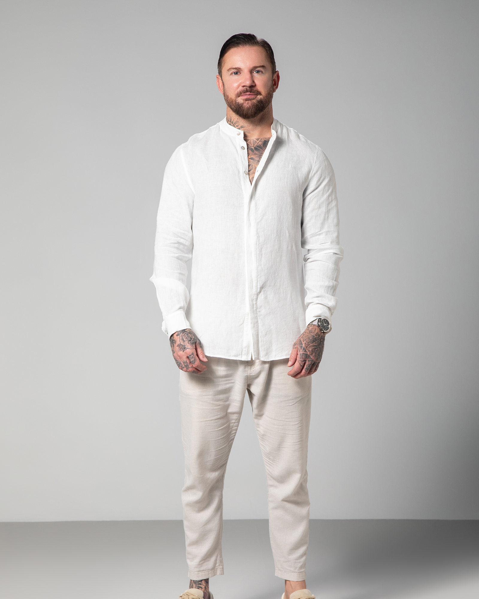 Full front view of model wearing the white St. Tropez Linen Shirt by Omni The Label – UAE, KSA, Qatar
