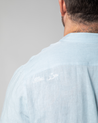 Close-up of Arabic embroidery "Free Your Mind" 
