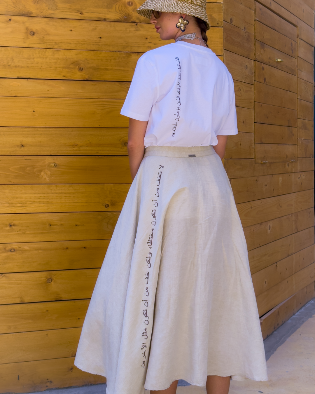 Linen maxi skirt with arabic caligraphy embroidered on the side. KSA UAE Qatar