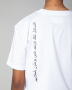 Full Arabic calligraphy printed vertically on back of white T-shirt by Omni The Label UAE KSA Qatar