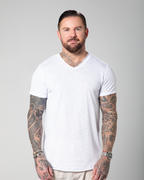 Front view of the Marbella white V-neck T-shirt for men, highlighting the soft slub texture and clean, minimal cut.UAE, KSA, Qatar
