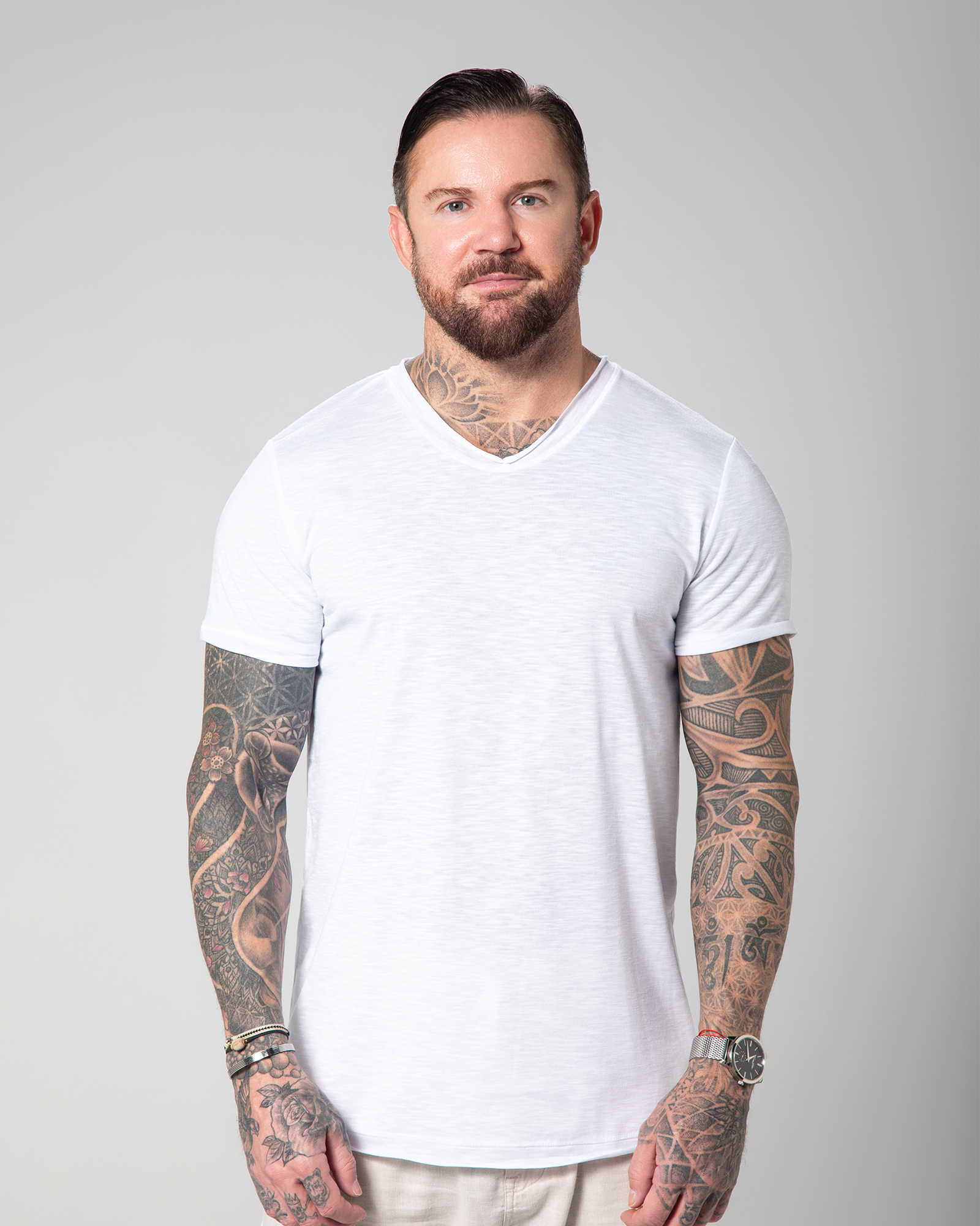 Front view of the Marbella white V-neck T-shirt for men, highlighting the soft slub texture and clean, minimal cut.UAE, KSA, Qatar

